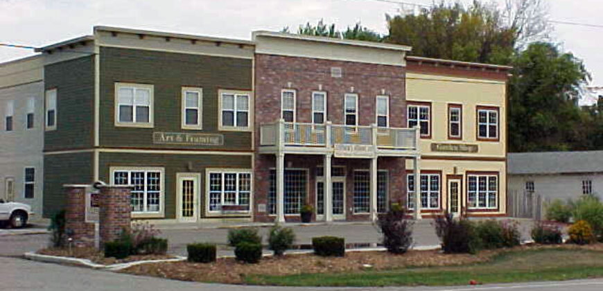 884 S. Janesville St. (Over-head door & Warehouse in back)